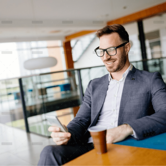 demo-attachment-1775-businessman-taking-a-break-with-a-cup-of-coffee-JW4B3DH